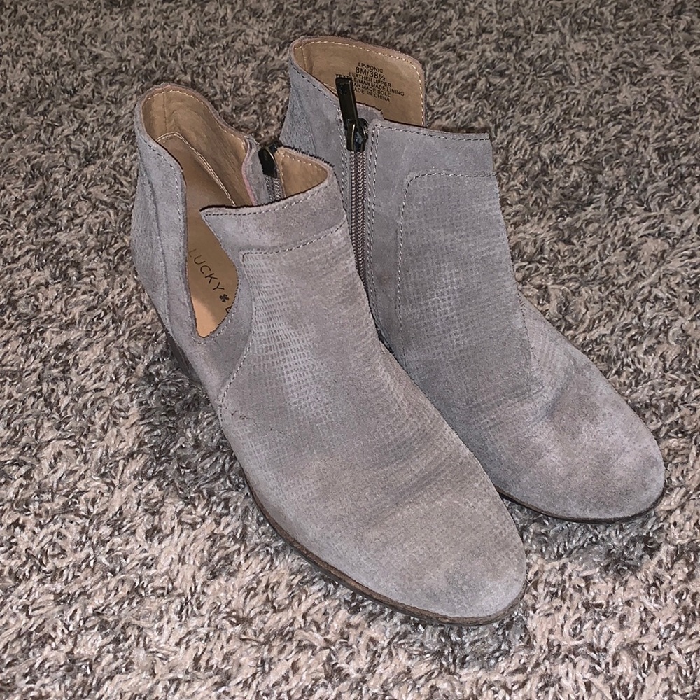 Grey suede booties.